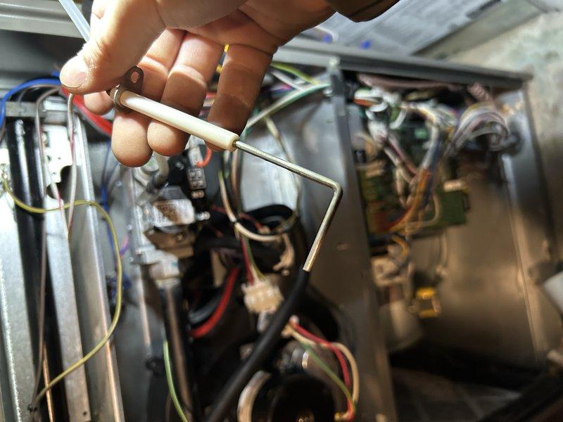 Diagnosed no-heat issue caused by Nest thermostat communication failure. Verified proper wiring connections and confirmed furnace operational status by bypassing thermostat. Installed T4 programmable thermostat replacement, performed complete furnace tune-up including cleaning components, replacing humidifier pad and air filter, testing humidifier functionality, and verifying proper temperature rise and gas pressure settings.