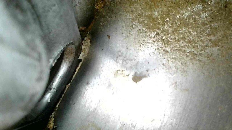 Responded to no-heat call for 15-year-old furnace system. Diagnosed faulty gas valve that was receiving proper signal but not opening, causing pilot light failure. Due to component failure and system age, replaced entire furnace unit rather than just the valve. Documented significant corrosion and wear on internal components through inspection photos.