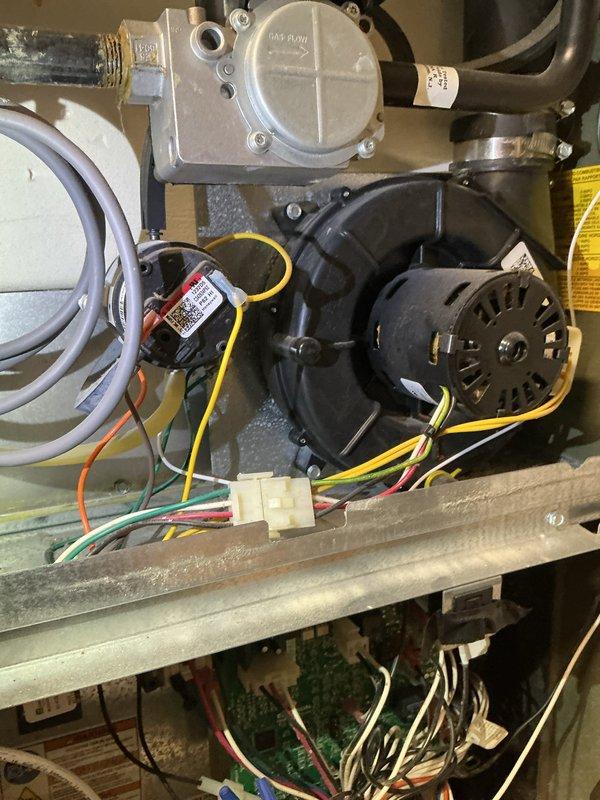 Performed maintenance tune-up on 12-year-old Trane furnace. Discovered cracked heat exchanger (over one inch past the crimp) and heavily soiled flame sensor. System was tagged out for safety due to the critical heat exchanger failure, and comfort advisor was notified regarding replacement options.