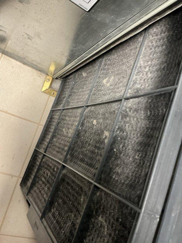 Performed maintenance tune-up on 12-year-old Trane furnace. Discovered cracked heat exchanger (over one inch past the crimp) and heavily soiled flame sensor. System was tagged out for safety due to the critical heat exchanger failure, and comfort advisor was notified regarding replacement options.