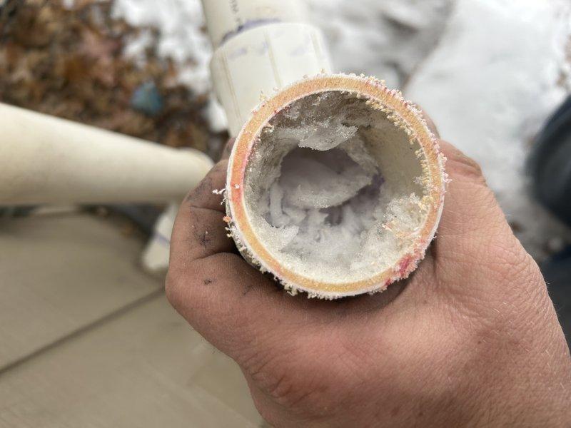 Responded to emergency service call for high CO levels. Discovered intake was completely plugged with ice and both intake/exhaust improperly terminated. Replaced incorrect pressure switches which were allowing furnace to operate with obstructed intake. Found significant mineral buildup in exhaust pipe and determined heat exchanger may be partially plugged. Emergency furnace replacement scheduled due to safety concerns.