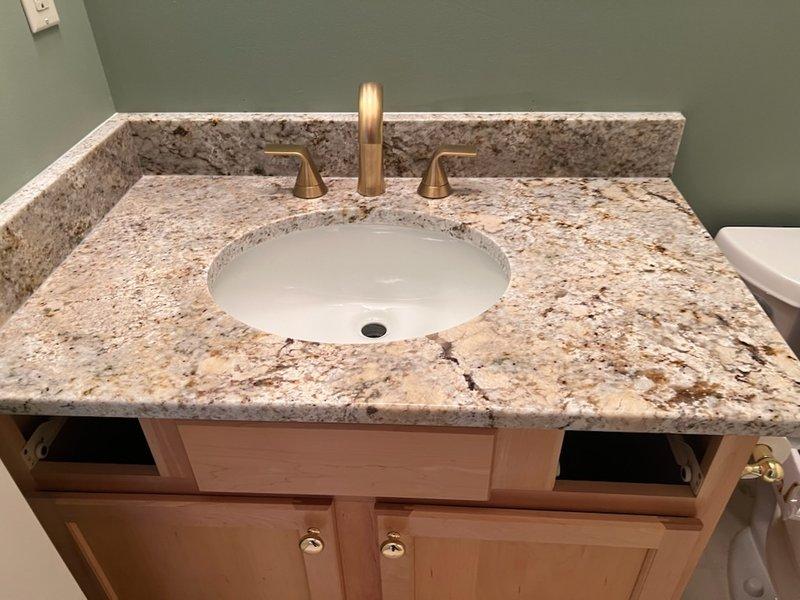 Completed installation of three customer-supplied lavatory fixtures and one kitchen faucet as requested. Successfully rehooked kitchen drain connection to ensure proper drainage. All fixtures were tested for functionality and correct water flow with no leaks observed.