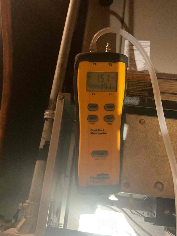 Performed comprehensive furnace tune-up on 10-year-old system. Cleaned dirty flame sensor and replaced filter. Conducted gas pressure testing with dual port manometer, verifying proper operation at 15.7 WC supply and -10.1 WC draft. Inspected blower assembly and internal components for proper condition and functionality.