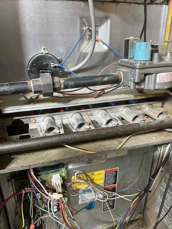 Responded to a service call for a 30-year-old furnace with intermittent operation issues. Diagnosed flame sensor contamination causing ignition failure after multiple ignition attempts. Performed flame sensor cleaning to restore proper ignition sequence. System was successfully tested after service, though customer was advised about the advanced age of the equipment.