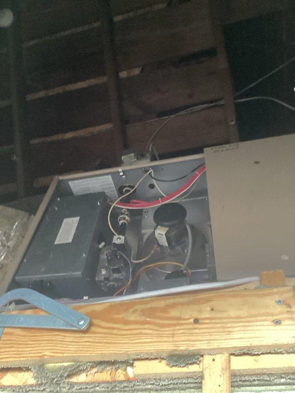 Responded to no heat complaint in upstairs apartment. Diagnosed furnace in attic with continuously running fan but no heat production. Located and repaired loose Molex connection on control board. Tested system operation multiple times with wire movement to verify repair stability. Inspected heat exchanger - no defects found. System now operating properly with heat restored. Advised customer about potential board replacement if issue recurs.