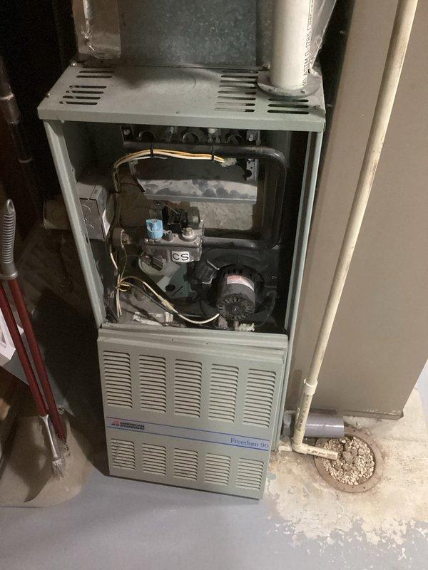 Responded to no-heat call for 1984 Goodman Freedom 80 furnace. Diagnosed ignition failure due to dirty flame sensor. Cleaned flame sensor, restored proper flame signal verification, and confirmed unit operating correctly with multiple test cycles. Customer interested in replacement quote; scheduled follow-up consultation.