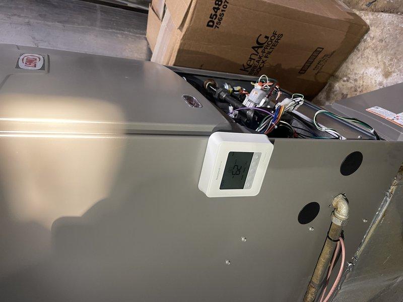 Diagnosed and resolved no-heat issue on recently installed furnace (3 days prior) by identifying water damage to parlor thermostat. Temporarily relocated thermostat to furnace housing in dry location to restore heating functionality. Completed paperwork for replacement agricultural-grade thermostat to provide proper long-term solution for the environment.