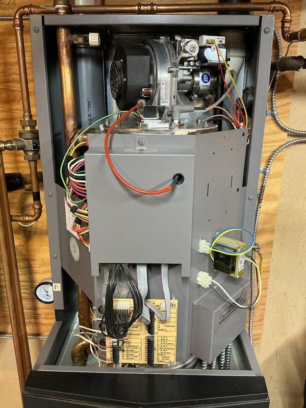 Responded to customer complaint of boiler experiencing flame fluctuations and vibration noise in the intake pipe, similar to previous issue addressed last year. Visual inspection revealed potential Venturi issue causing the rattling sound. Due to specialized tooling requirements needed for proper disassembly and repair, service has been rescheduled for a follow-up visit with appropriate equipment.