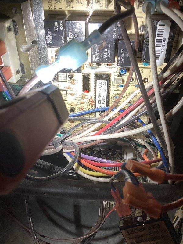 Diagnosed 20-year-old natural gas furnace exhibiting no heat condition. Found control board displaying erratic diagnostic flashes, blower motor with hard-starting condition, and severely corroded pressure switch on combustion blower assembly. Customer advised of repair options and opted for system replacement evaluation.