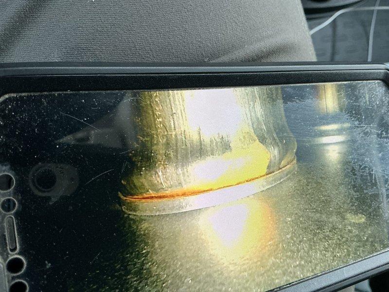 Diagnosed 14+ year old Amana furnace with no heat operation. Inspection revealed severe corrosion on burners, suspected heat exchanger leak above high limit, and failing inducer motor. Observed incomplete combustion cycle where ignition would initiate but not sustain. Documentation included photos of extensive corrosion damage and compromised metal fittings. Recommended complete furnace replacement due to multiple critical component failures and age of system.