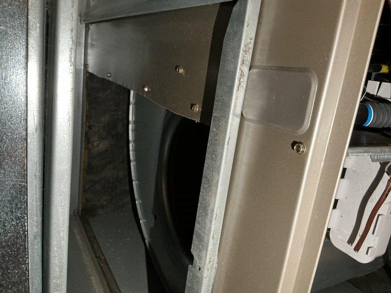 Responded to a no heat complaint in a vacant property with furnace short cycling due to overheating. Diagnosed multiple issues: inducer draft motor failing and causing improper exhaust ventilation, incorrectly sized filter boot restricting proper airflow, and excessive gas pressure in low fire (over 2" wc, above the 1.3"-1.7" manufacturer range). Adjusted gas pressure down to 1.38" wc, removed filter, and restored proper heat operation with extended run cycles.