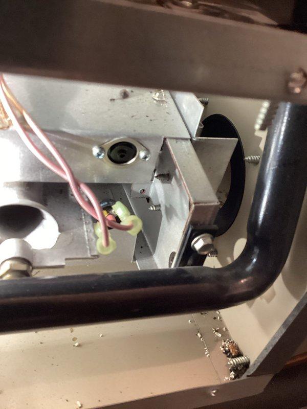 Performed annual furnace tune-up on 20-year-old natural gas system. Discovered detached rollout switch during burner inspection, which presented a significant safety hazard. Replaced switch with compatible component and restored proper operation. Visual inspection of heat exchanger revealed several suspicious areas that warrant monitoring but don't require immediate action. Customer advised about planned water heater replacement in spring.