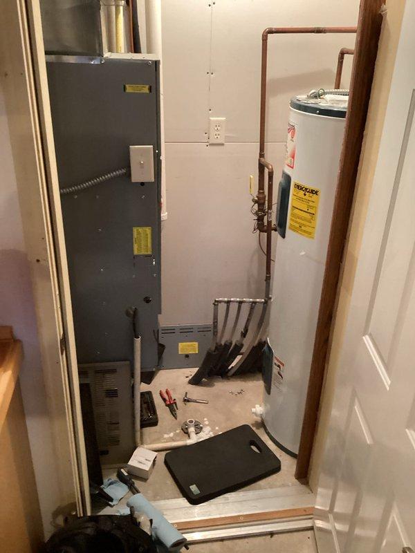 Performed annual furnace tune-up on 20-year-old natural gas system. Discovered detached rollout switch during burner inspection, which presented a significant safety hazard. Replaced switch with compatible component and restored proper operation. Visual inspection of heat exchanger revealed several suspicious areas that warrant monitoring but don't require immediate action. Customer advised about planned water heater replacement in spring.