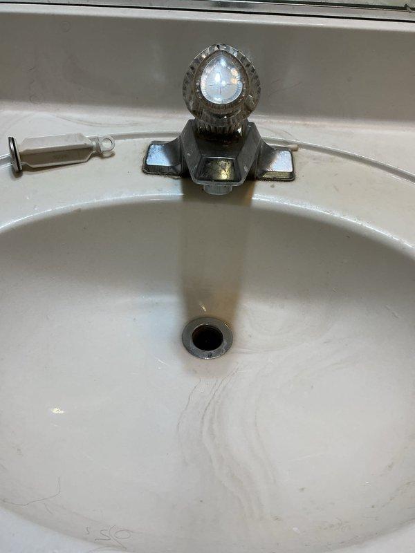 Responded to service call for multiple plumbing issues. Diagnosed and cleared clog in bathroom sink drain to restore proper drainage. Identified hole in dishwasher drain line under kitchen sink requiring replacement. Customer opted to complete dishwasher drain repair independently after receiving repair options.
