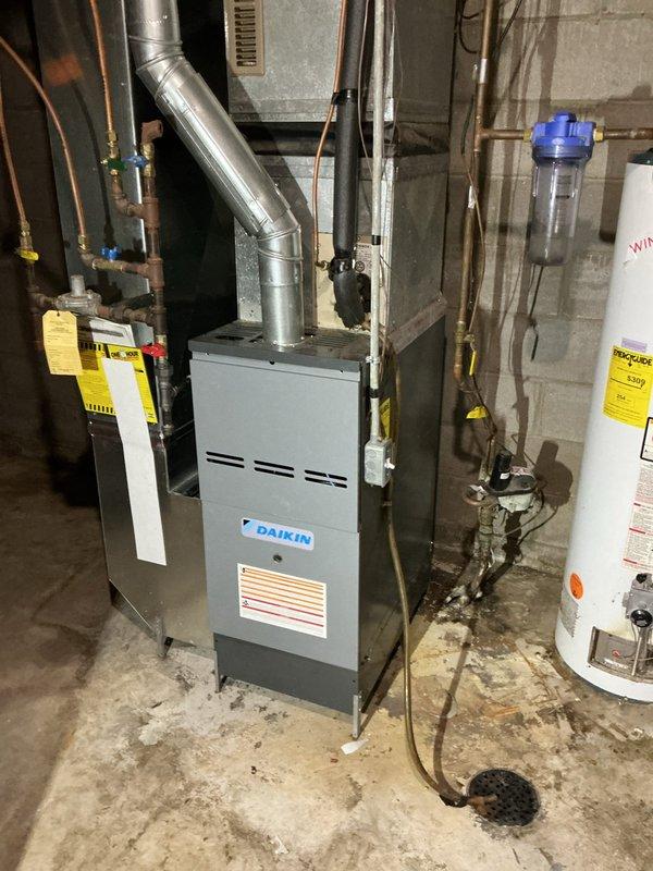 Conducted comprehensive plumbing inspection for new Family Rewards customer, documenting significant issues including severe mineral buildup and discoloration in toilet tank components requiring service. Evaluated HVAC/plumbing systems in basement including Daikin furnace unit, water heater, and water filtration system, with multiple items identified requiring attention as detailed in provided checklist and estimates.