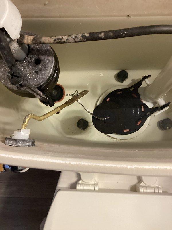 Diagnosed upstairs bathroom toilet not filling with water due to broken flush lever and loose tank stopper. Removed existing damaged handle assembly, installed new toilet handle from Ace Hardware, and secured the stopper mechanism. Also addressed sink issue in same bathroom by reinstalling and securing the sink stopper that had come loose.