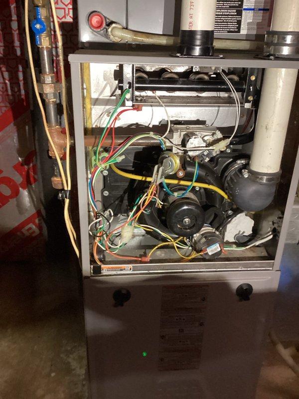 Responded to a no-heat call for a 6-year-old furnace. Diagnosed rolled out switch activation and discovered heat exchanger with multiple perforations as evidenced by visible holes. Tagged unit as unsafe, shut off gas supply, and recommended against operation. Informed customer of need for heat exchanger replacement and arranged for advisor consultation regarding potential furnace replacement options.