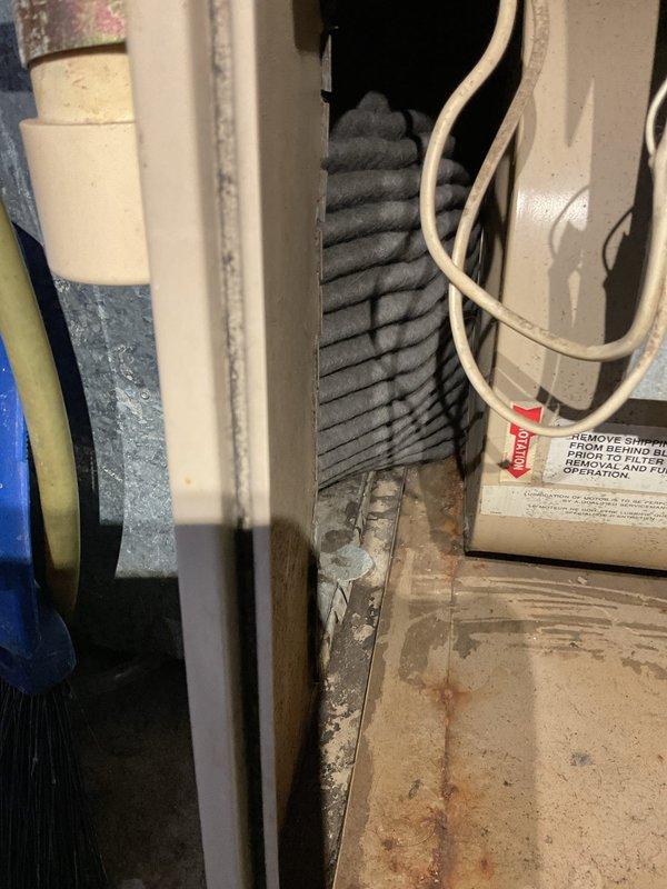 Responded to no-heat call for 30-year-old furnace. Discovered broken door latch preventing power switch engagement, and identified significant cracks on burner face plate. Photos of heat exchanger damage were sent to technical support team, who authorized immediate safety tag-out of the system. Temporarily restored operation but tagged unit as unsafe due to compromised heat exchanger integrity. Provided homeowner with safety advisory documentation and scheduled emergency service appointment.