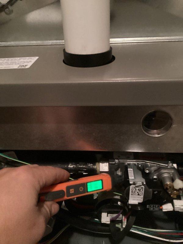 Responded to warranty service call for CO2 alarm activation in recently installed furnace. Investigation revealed blocked venting system due to improperly secured termination fittings that were not glued, causing ice buildup below the gooseneck and resulting in high carbon monoxide readings with low O2 levels. Repaired venting connections, tested system operation in both high and low fire modes, and verified safe operation after repairs.