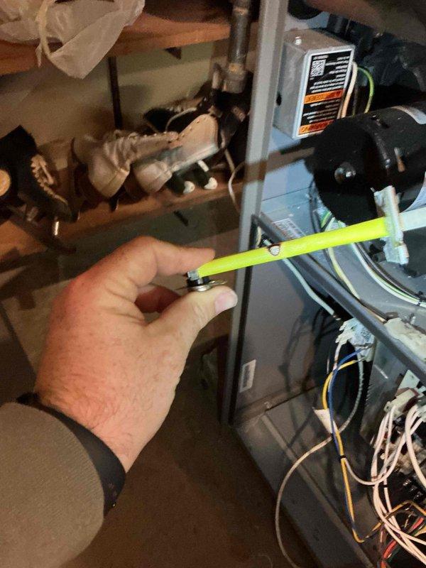 Diagnosed and resolved no heat complaint on 8-year-old Lennox furnace. Found faulty thermostat showing continuity between G and Y terminals when off, and discovered high limit switch shorting against heat exchanger with visible burn marks on shield. Replaced thermostat, high limit switch, and control fuse. Conducted operational testing to confirm proper system function with all issues resolved.