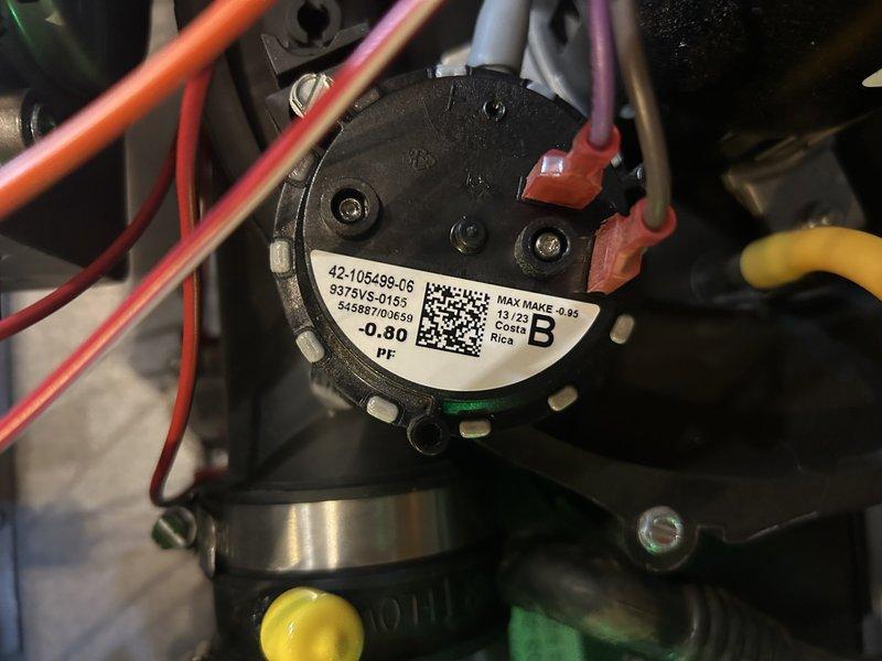 Responded to no-heat call for 2-year-old furnace displaying Code 57 (pressure switch open). Discovered vacuum pressure at -1.6 inches on pressure switch rated for -0.8 inches. Reset furnace which temporarily restored operation, but unit tripped again during diagnostic testing. Determined faulty pressure switch requiring replacement. Noted customer had previously replaced thermostat and corrected exterior venting issues.