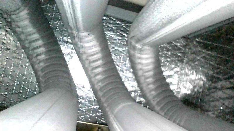 Diagnosed and resolved no-heat issue with Goodman high-efficiency furnace. Customer's Nest thermostat was backfeeding power through Y-wire attempting to charge its battery, preventing proper heating cycle operation. Though system had functioned with only four wires for years, installed new thermostat wire with common connection to resolve compatibility issues. Verified proper system operation after installation with successful heating cycle.