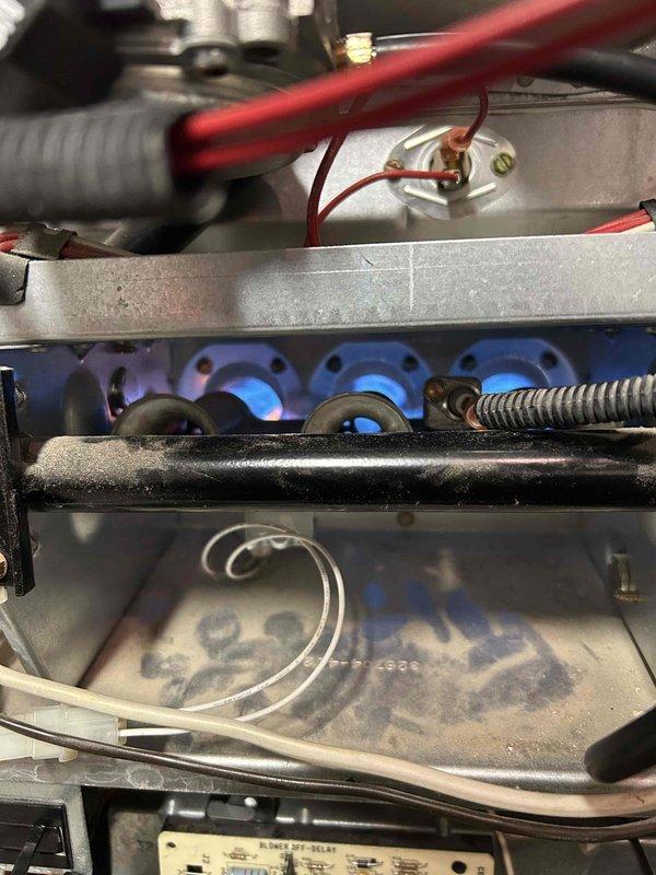 Performed comprehensive tune-up on 12-year-old furnace per recurring service agreement. Conducted full inspection including combustion analysis, gas pressure verification, flame sensor/burner cleaning, and heat exchanger evaluation. System is operating normally with no immediate concerns identified; replaced moderately soiled air filter and cleaned pressure switch to ensure optimal performance.