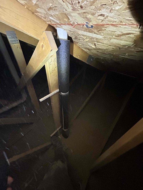 Responded to no-heat call for a 3-5 12-4 NG furnace displaying "LPS Pressure switch" error. Diagnosed exhaust vent blockage in attic causing system failure. Cleared blocked exhaust vent piping, which allowed proper venting and restored normal furnace operation.