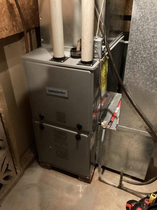 Responded to no-heat callback on Comfortmaker furnace (approximately 4 years old) that was experiencing ignition fault codes. Diagnosed a plugged condensate trap that was causing the pressure switch connected to the LP gas regulator to trip. Removed trap, performed thorough cleaning, reinstalled components, and verified proper operation with multiple test cycles.