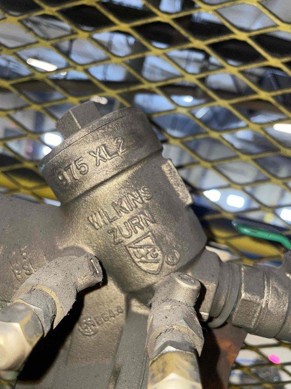 Conducted inspection and testing on three ASSE 1013 RPM backflow preventers per reference PO T1154. All Wilkins Zurn devices were accessed through Door 11 and successfully tested, with all three cross connectors functioning properly with no failures or issues identified.