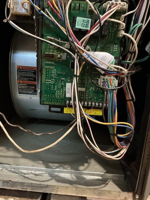 Performed diagnostic service on 9-year-old furnace that was cycling irregularly and failing to maintain thermostat temperature. Identified dirty flame sensor as the root cause, cleaned the component, and performed system verification. Combustion analysis with Testo 310 II confirmed proper operation with 93.8% efficiency and normal CO levels. No abnormal noises detected during operation, and temperature split measurements were within specification.
