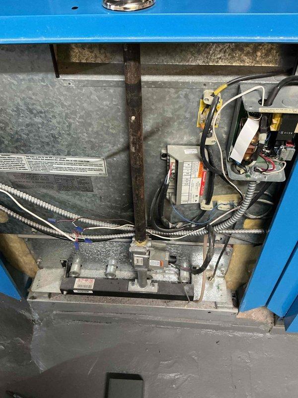 Responded to customer report of unusual noise from heating system. Diagnosed failed heat exchanger and malfunctioning gas valve on left side of boiler system. Unit still providing heat despite issues. Documented condition of aging NG system with radiators for follow-up replacement recommendation.