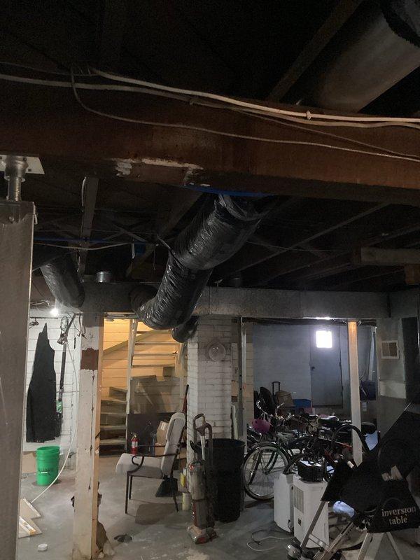 Responded to complaint of mildew odor emanating from heating system of 3-year-old furnace. Conducted thorough inspection of furnace, blower cabinet, coil, and heat exchanger with no visible issues identified. Observed mouse droppings near supply boot and suspect deceased rodent in ductwork is causing odor. Customer opted to defer further investigation at this time.