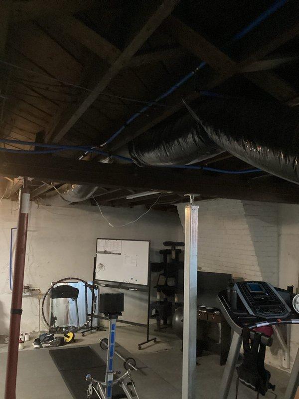 Responded to complaint of mildew odor emanating from heating system of 3-year-old furnace. Conducted thorough inspection of furnace, blower cabinet, coil, and heat exchanger with no visible issues identified. Observed mouse droppings near supply boot and suspect deceased rodent in ductwork is causing odor. Customer opted to defer further investigation at this time.