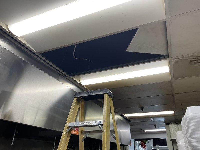 Responded to service call for commercial tankless water heater system with leak. Upon inspection, identified one non-functioning unit in a three-heater cascade configuration was leaking. Attempted to isolate the leaking unit using existing valves, but valves were inoperable. Successfully capped the hot and cold 3/4" copper supply lines to the third heater to eliminate the leak while maintaining operation of the two functional units.