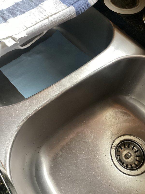 Successfully removed non-functioning garbage disposal and reconfigured plumbing to a standard drain configuration. Installed sink basket in place of the disposal unit and verified proper drainage through newly connected P-trap assembly. All connections were secured and tested for leaks prior to completion.