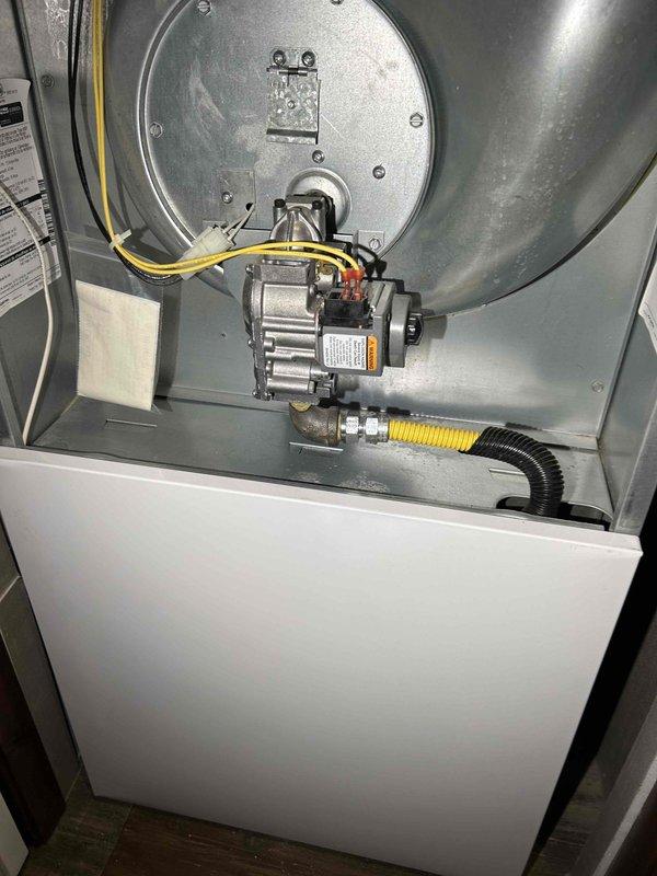 Responded to no-heat call for 4-year-old furnace with reported flashing red light and ignition issues. Upon arrival, furnace was operating normally. Performed comprehensive diagnostic testing using Fluke 365 True RMS Clamp Meter on electrical components and inspected ignition system. Checked pressure switch, hot surface ignitor, and gas valve functionality. Examined blower motor assembly and verified proper gas line connections. Cleaned and replaced air filter to ensure optimal airflow. No immediate concerns identified; system functioning properly at completion of service.