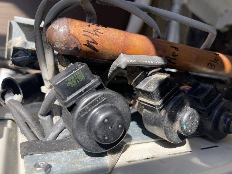 Tested mini-split system with multiple issues and installed replacement parts as specified. Upon installation, unit remained non-operational. After consultation with technical support, determined high voltage from customer's solar system (251V) is likely damaging control boards. Recommended replacement of control board and condenser fan motor pending resolution of excessive voltage from solar back-feed.