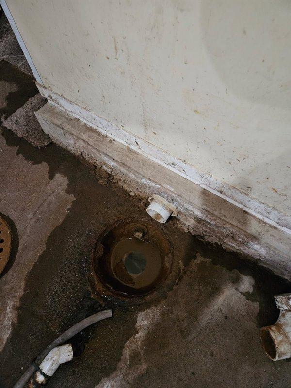 Responded to drainage issue where kitchen drain pipe was initially damaged during snaking procedure. Discovered a broken 90-degree elbow fitting in basement area below dishwasher. Completed repairs by removing damaged cast iron section and re-piped the affected area with new PVC materials to restore proper drainage function.