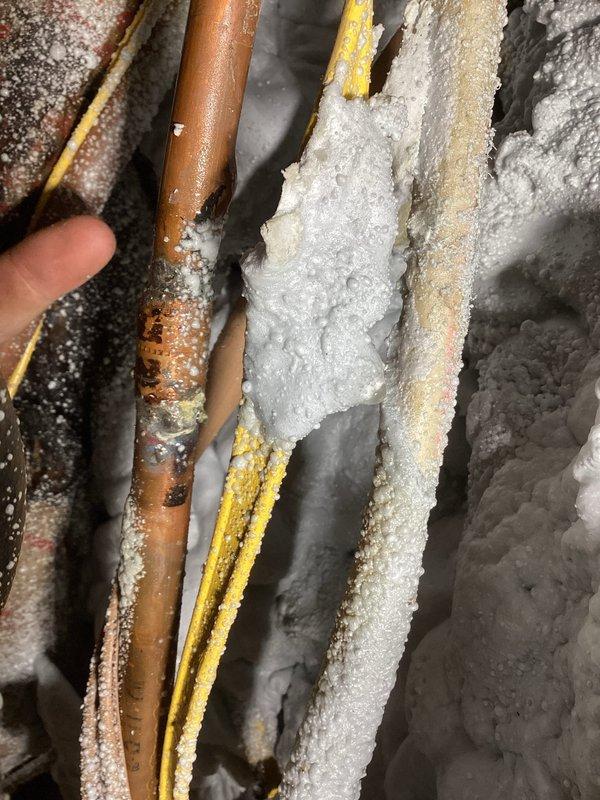 Located and repaired a burst pipe in a challenging crawl space with significant ice buildup due to non-functioning heat in that area. Replaced approximately 5 feet of damaged line with PEX and installed new valves in the laundry room, resolving the leak despite difficult access through a very small crawl space opening.
