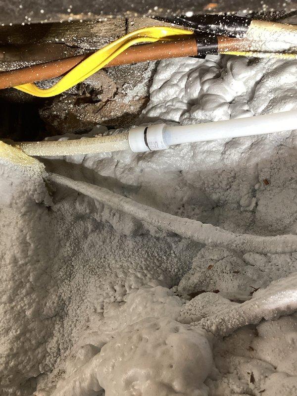 Located and repaired a burst pipe in a challenging crawl space with significant ice buildup due to non-functioning heat in that area. Replaced approximately 5 feet of damaged line with PEX and installed new valves in the laundry room, resolving the leak despite difficult access through a very small crawl space opening.