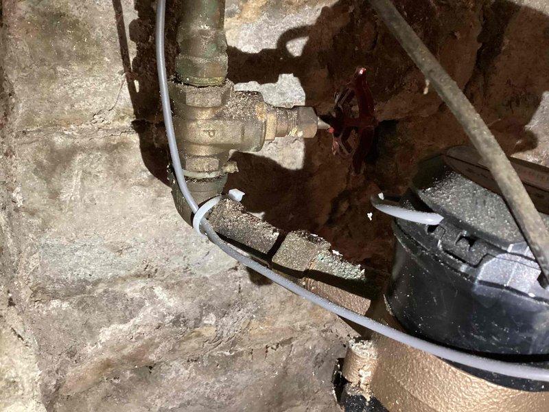 Installed new 50-gallon SV water heater in basement utility area as specified in work order. Completed necessary pipe connections and updated older brass/copper fittings showing mineral buildup. Properly vented system according to code requirements.