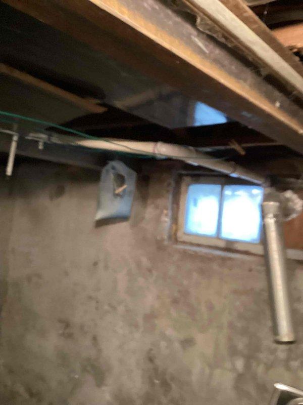 Installed new 50-gallon SV water heater in basement utility area as specified in work order. Completed necessary pipe connections and updated older brass/copper fittings showing mineral buildup. Properly vented system according to code requirements.