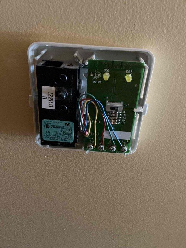 Responded to service call for air exchanger issues causing window frosting. Diagnosed non-functional Carrier control system and determined need for compatible Lennox control replacement. Will return to complete installation of new control unit.