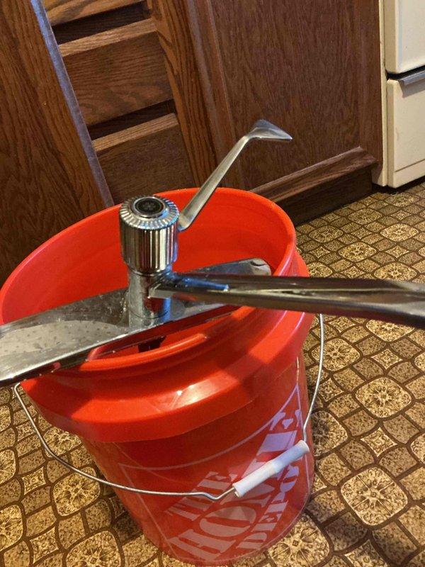 Replaced old kitchen faucet with new Moen single-handled model after meeting with customer POC (Sam). Original fixture was deteriorated and difficult to operate; successfully installed and tested new faucet functionality.