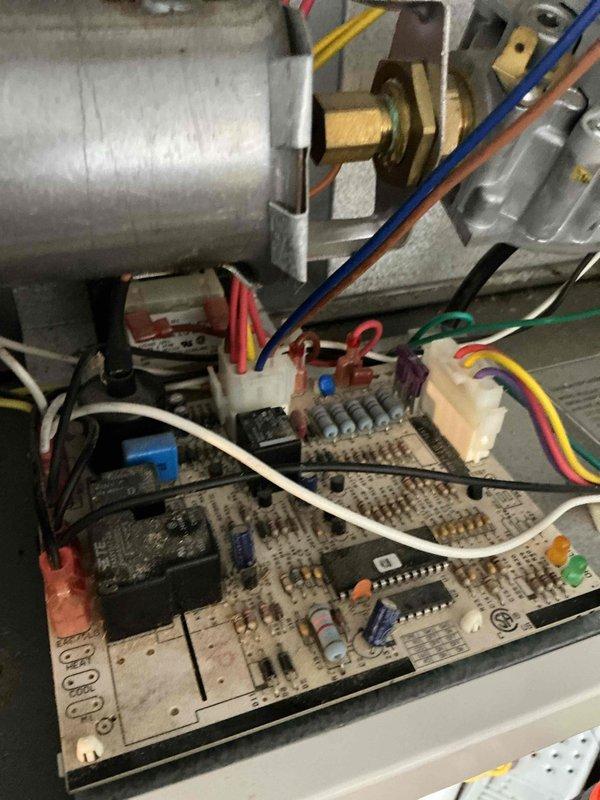 Diagnosed Reznor garage heater failure following lightning strike damage. Confirmed 120V power supply to control board but no voltage output to transformer. Replaced failed control board to restore heater functionality.