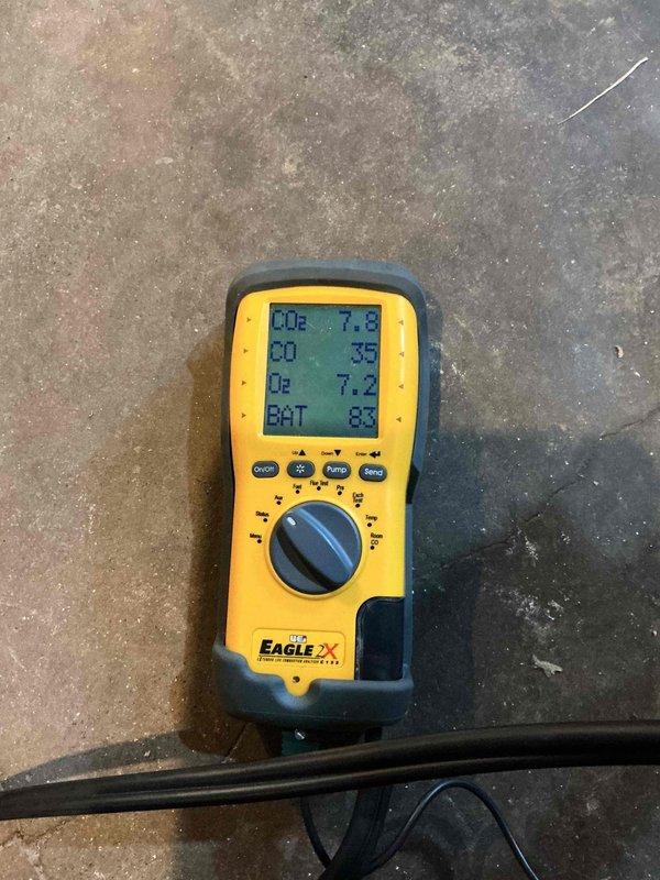 Performed standard boiler tuneup service with diagnostic testing using Eagle 2X gas analyzer, which indicated CO2 at 7.8%, CO at 35ppm, and O2 at 7.2%. Found system pressure exceeding 20 PSI; adjusted pressure to proper operating range. Addressed customer's concern about gurgling noise which was likely related to the excessive pressure condition.