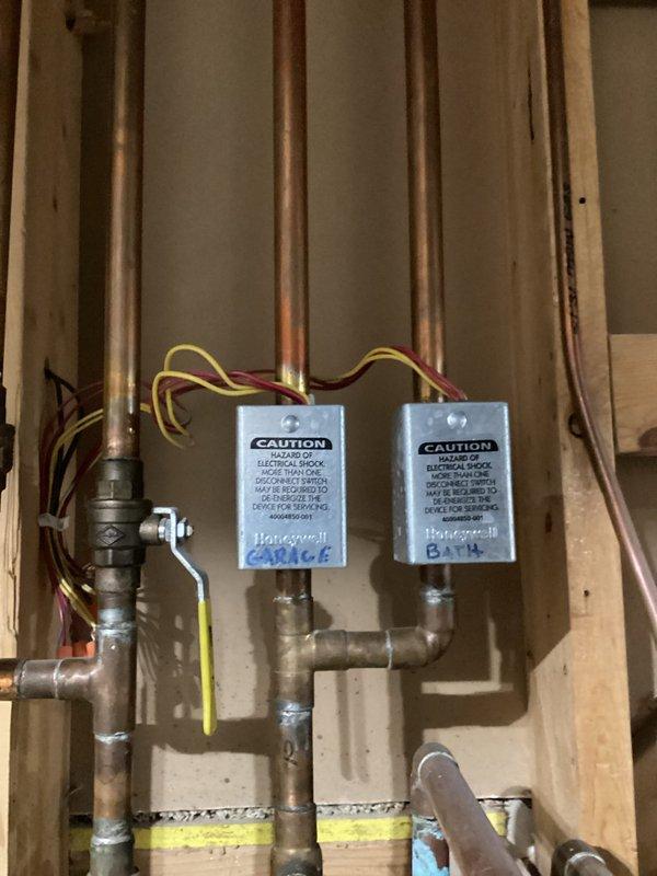 Responded to service call for floor heating issues in garage area of boiler system installed approximately 2 years ago. Upon inspection, verified thermostat was calling for heat and zone valve was functioning properly. After running system for 20 minutes, observed three loops heating normally while two loops (likely the longest exterior runs) remained cool. Explained to homeowner that the system appears to be operating as designed, with delayed heating in the furthest loops being expected behavior. Recommended continued monitoring of system performance.