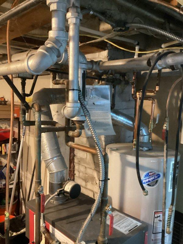 Successfully completed a 5-hour boiler maintenance service involving the replacement of a malfunctioning pressure gauge and installation of a new expansion tank with shut-off valve. After draining down the multi-level system, refilled the boiler, performed comprehensive air bleeding, and verified proper system cycling and operation to ensure optimal heating performance.