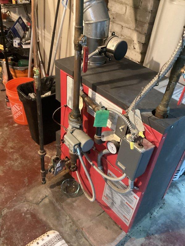 Successfully completed a 5-hour boiler maintenance service involving the replacement of a malfunctioning pressure gauge and installation of a new expansion tank with shut-off valve. After draining down the multi-level system, refilled the boiler, performed comprehensive air bleeding, and verified proper system cycling and operation to ensure optimal heating performance.